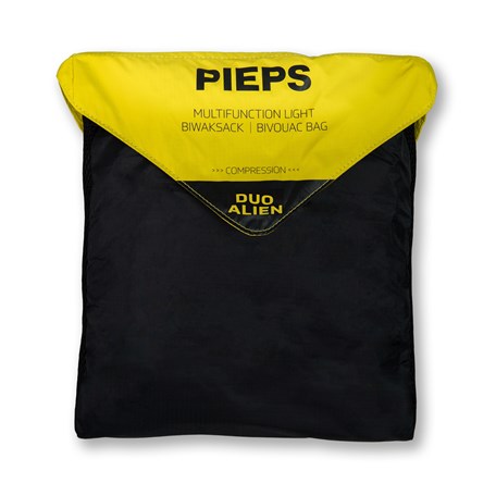 Zu Sitzunterlage ausgebreiteter schwarz-gelber Biwaksack mit PIEPS-Logo 